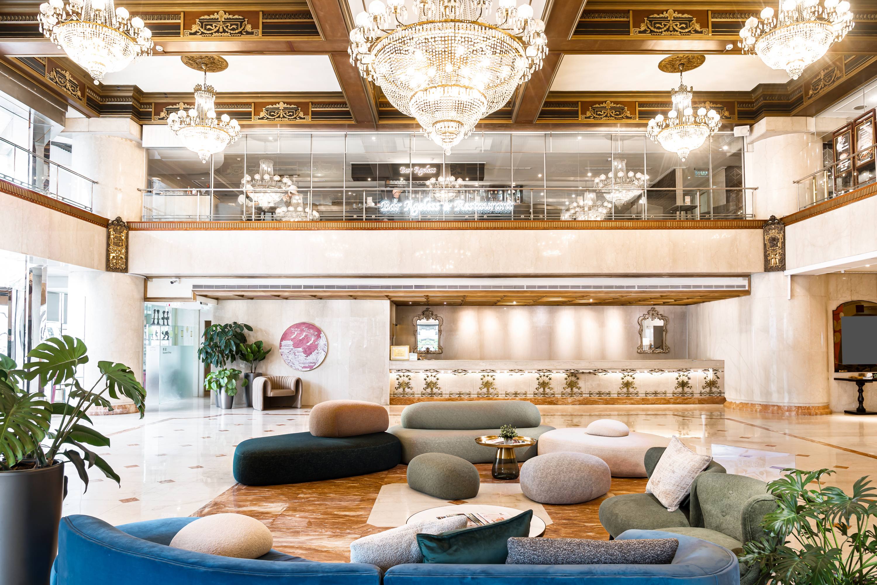 T Hotel grand lobby with crystal chandeliers